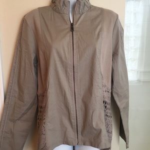 Large beige zippered jacket w/ cut out designs